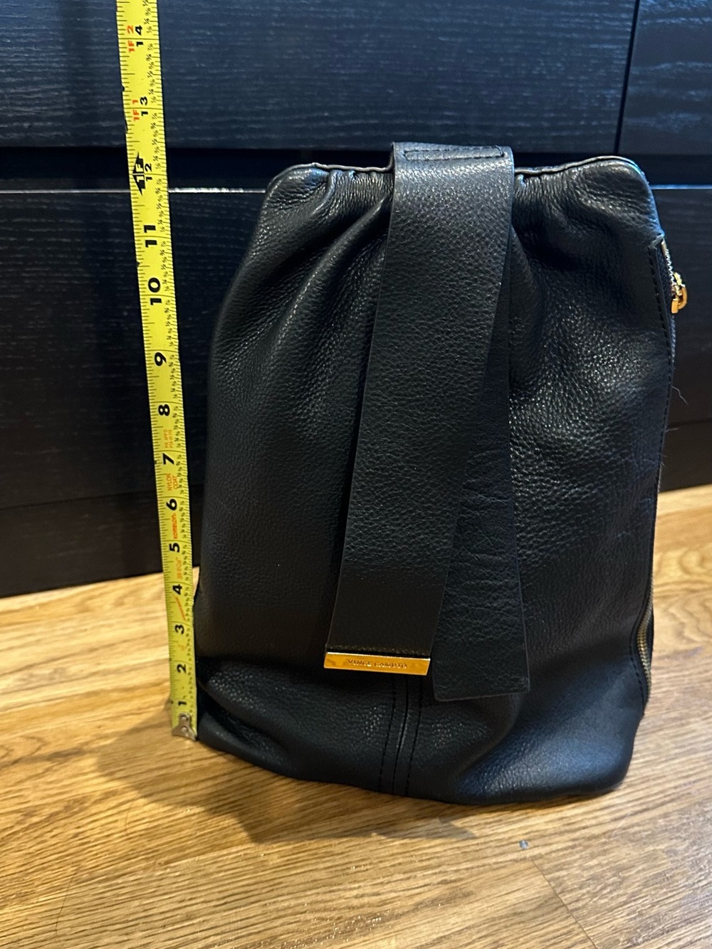 Vince Camuto Black Leather sling Backpack with Gold Accent